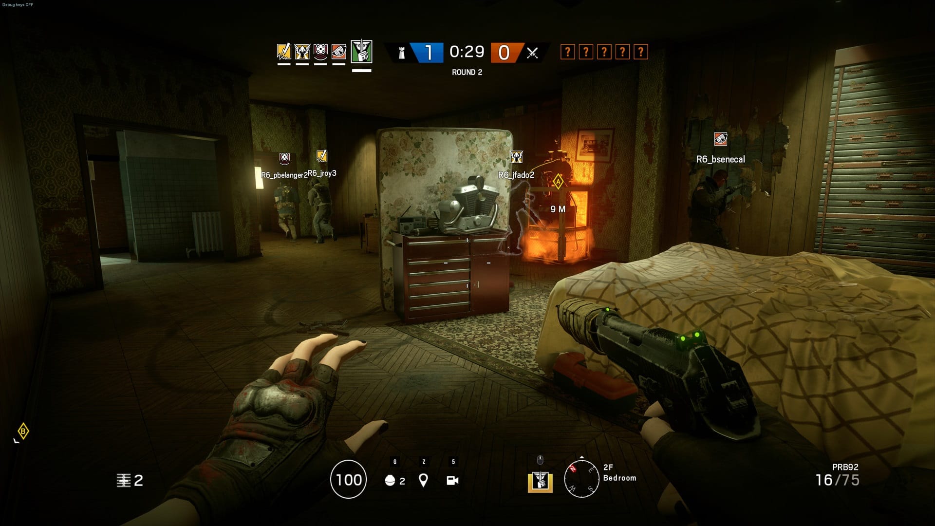 Best multiplayer games: Rainbow Six Siege. Image shows somebody with a gun in hand, preparing to defend their base with their friends.