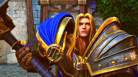 Warcraft 3 Reforged review: A blond man in hulking silver armour hoolds a hammer looking at the camera