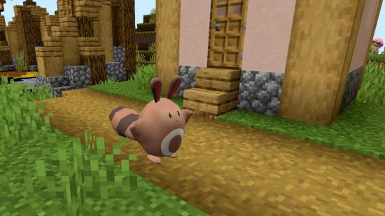 A wild Sentret appears in a Minecraft village in the Pixelmon Reforged mod.
