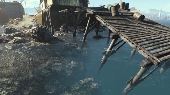 Best Fallout 4 mods: A rocky shore with a collapsed dock half-submerged by a river