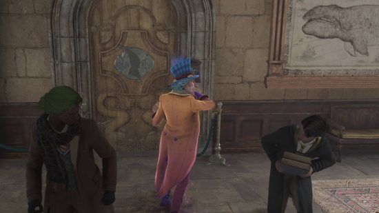 Hogwarts Legacy characters - Peeves is bullying a child in a corridor.