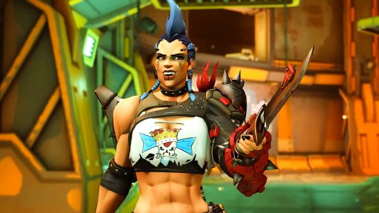 Overwatch 2 hero - Junker Queen, a brash, muscular Australian woman with a tall blue mohawk and ripped crop top, grinning as she brandishes her signature knife