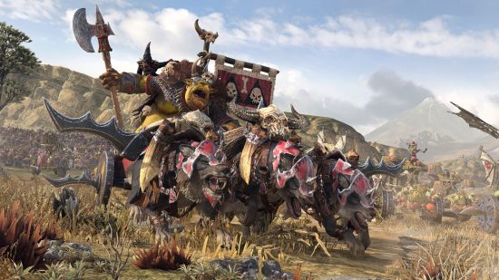 Best grand strategy games: Total War: Warhammer 2. Image shows orcs riding along on giant wolves.