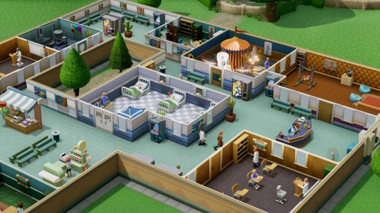 Games like Sims: An overview of a hospital in Two Point Hospital, showing a GP's office, ward, and an assortment of examination rooms.