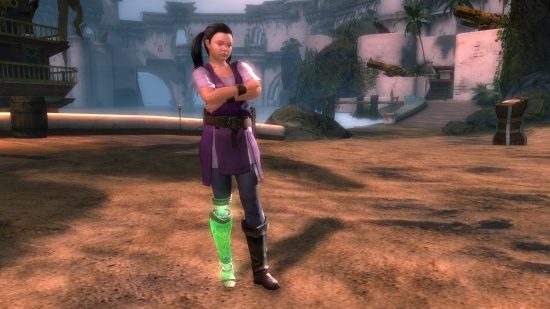 Der neue Guild Wars 2-Charakter bringt einen echten Helden ins MMO: Ein kleines Mädchen mit schwarzen Strähnen trägt eine Schürze und steht mit verschränkten Armen da, mit einer hellgrünen Beinprothese