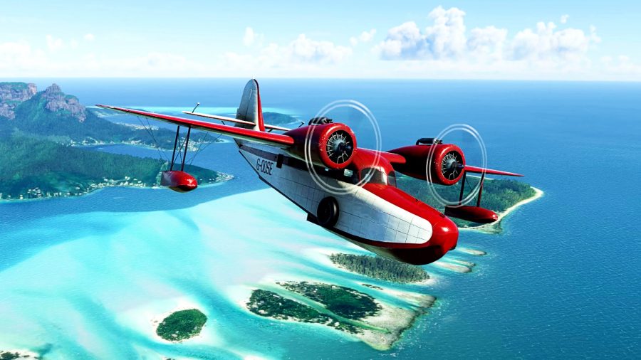 Microsoft Flight Simulator - a red and white plane soars over an ocean view dotted with small islands