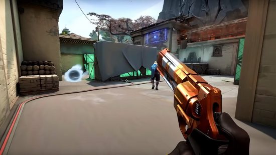 Best PC games - Valorant sees a variety of weapons including this orange and silver handgun