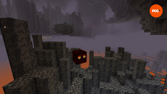A Magma Cube bounces along basalt in the Basalt Delta, one of the Nether biomes in Minecraft.