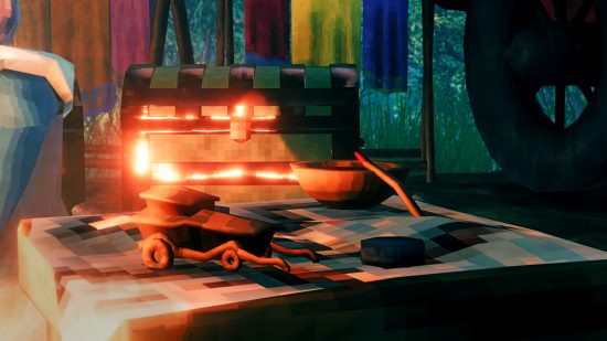 Valheim Hildirs Quest-Update – Vorschaubild von Hildirs Zuhause.  Eine Truhe und eine Rührschüssel stehen auf einem Holzbrett auf dem Boden in der Nähe eines Wäscheständers, an dem Kleider hängen, und dem Rad eines scheinbar größeren Wagens oder einer Struktur