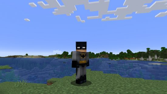 Best Minecraft skins: A cool grey and black batman minecraft skin with a mask and white eyes.