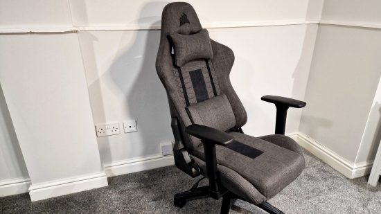 Corsair TC100 Relaxed review: A grey and black gaming chair against a white wall