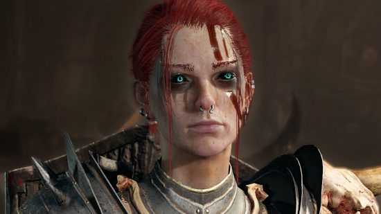 Diablo 4 Patchnotizen 1.0.4 – eine Nekromantin mit roten Haaren, die zu einem Pferdeschwanz zurückgebunden sind, durchdringenden blauen Augen, einem Septumring und blutverschmiertem Gesicht.