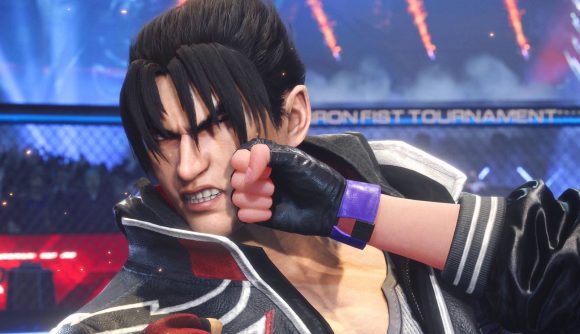 Tekken 8 tier list: A character with jet black hair receives a punch to the face from a gloved hand and winces