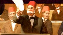 Victoria 3 roadmap details free updates for Paradox grand strategy game amid struggling Steam reviews - A man in a black suit and red hat with a white moustache holds up a sheet of paper, while shouting.