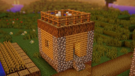 A small hut with chickens on the roof, and a warm glow in the atmosphere, thanks to one of the best Minecraft shaders, Potato shaders.