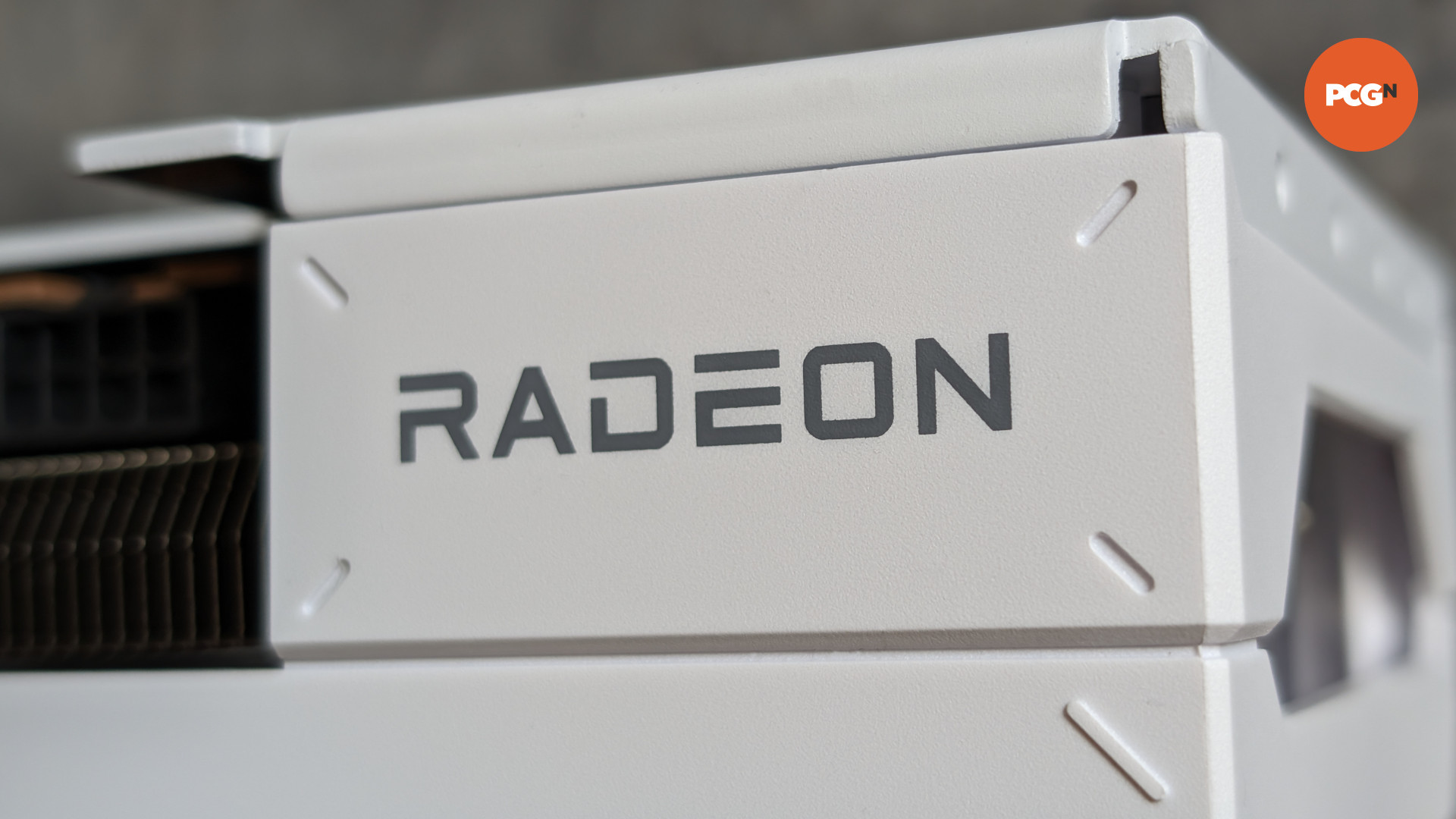 AMD Radeon RX 7900 GRE Sapphire Pure review: Edge of cooler showing Radeon logo