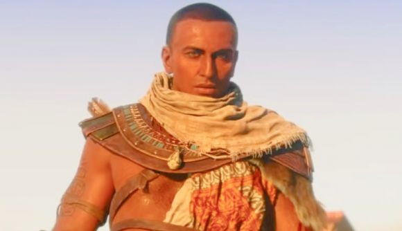 A bundle of almost every Assassin's Creed game is more than $200 off: A man with a shaved head and ancient Egyptian clothing, Bayek from Assassin's Creed Origins.