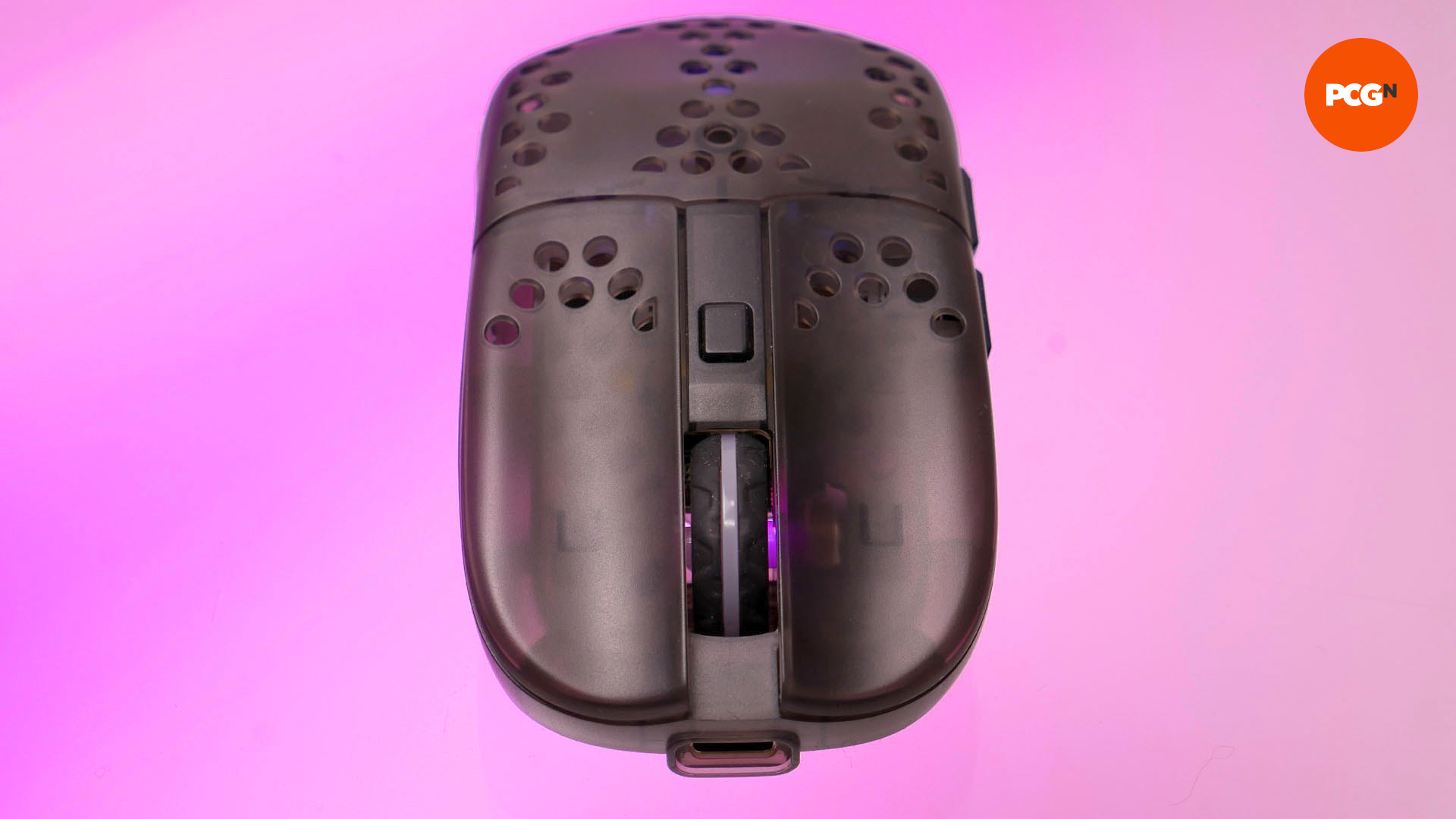 The front of the cherry xtrfy mz1 wireless mouse on a purple background