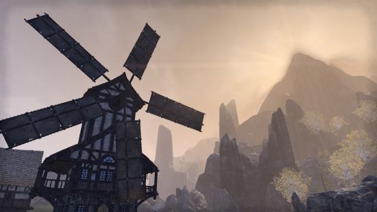 A scene from ESO with a windmill turning against a misty mountain in the distance.