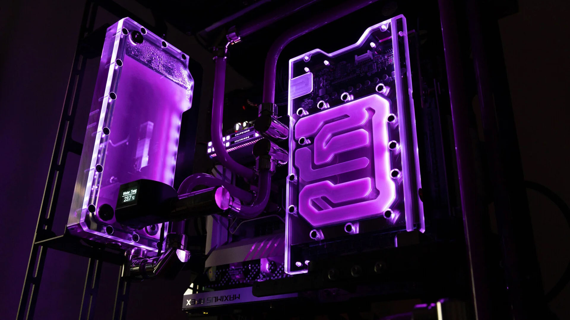 The RGB-lit water-cooled gaming PC in an open-air case