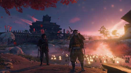Ghost of Tsushima PC review: a castle lit with a beautiful pink and blue haze.