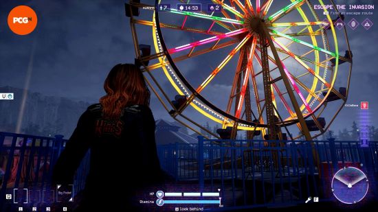 The player character looks up and admires a brightly lit funfair ride in one of the Killer Klowns from Outer Space maps.