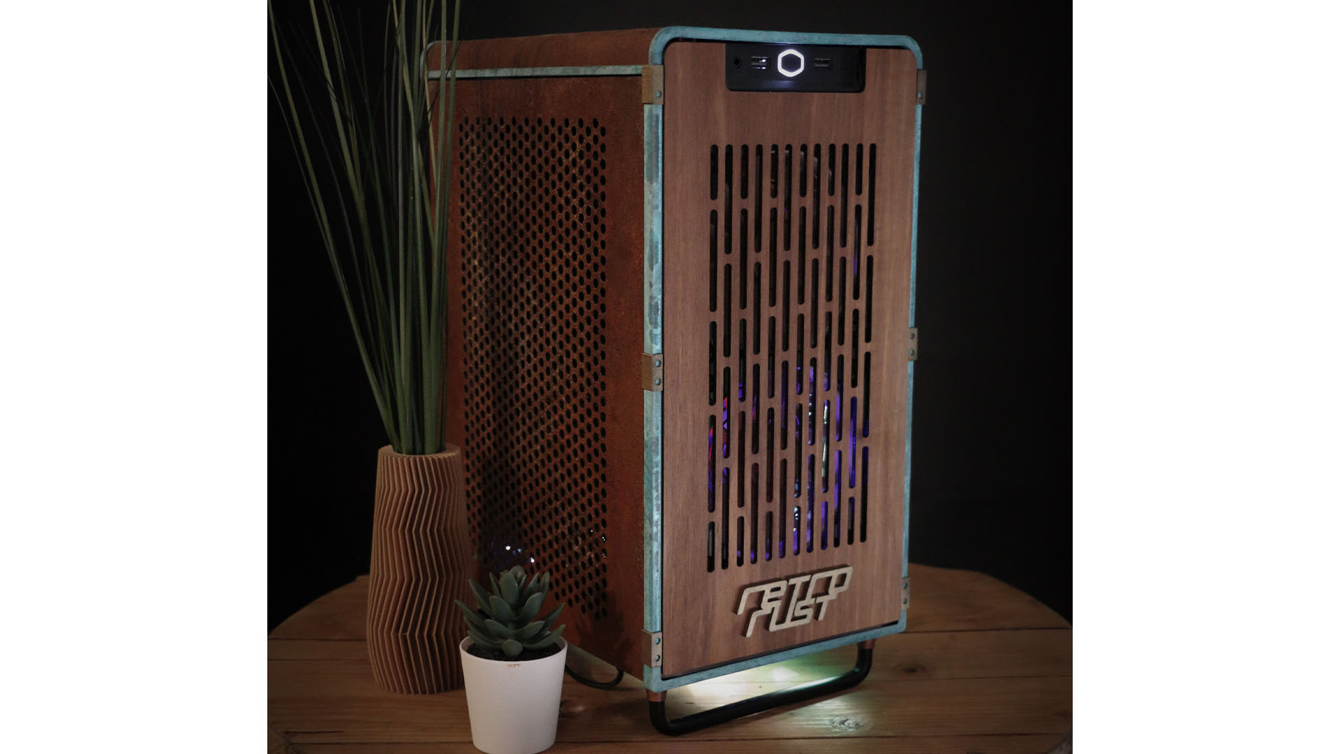The mini ITX gaming PC with wooden panels and a leather top