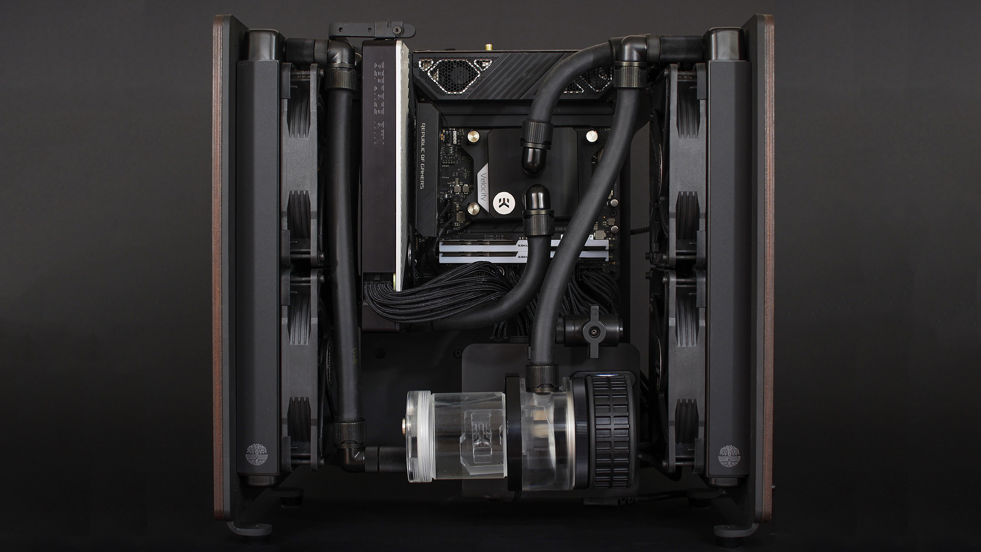 The mini gaming PC with custom water-cooling and wooden sides