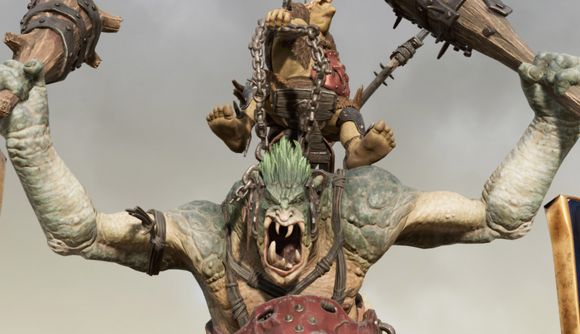 Save 90% on Warhammer games and claim free stuff in huge new sales: A colossal creature attacks, with another small creature riding in a chair on its back.