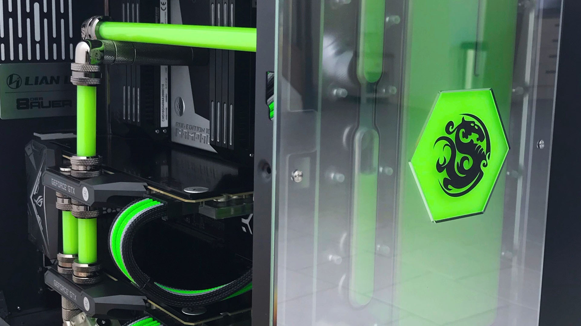 The bright green logo on the front of the acid rain gaming pc