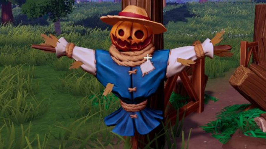 Ale and Tale Tavern - A pumpkin-headed scarecrow.