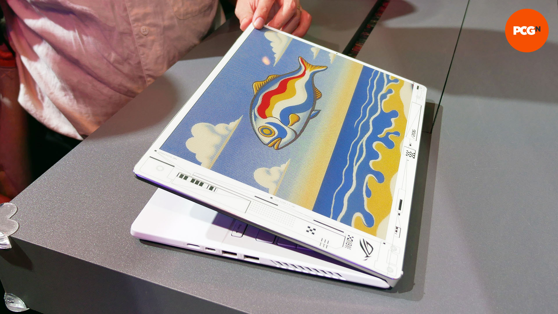 Asus Project Dali: Customizable E-ink laptop lid curated design of flying fish