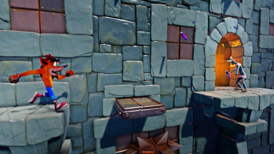 Crash approaches a moving ledge in one of the most challenging levels in Crash Bandicoot N. Sane Triology, one of the best platform games.