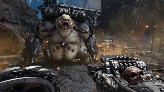 Doom The Dark Ages release date: a huge blob-like demon is about to be made into mincemeat by the Doom Slayer's skull-grinding gun.