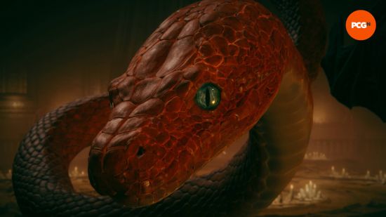 Elden Ring bosses: a big red snake leers at the camera.