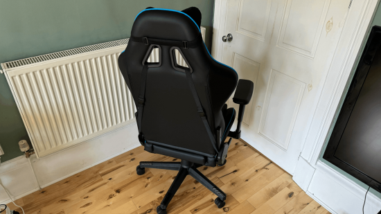 The back of a black and blue compuer chair