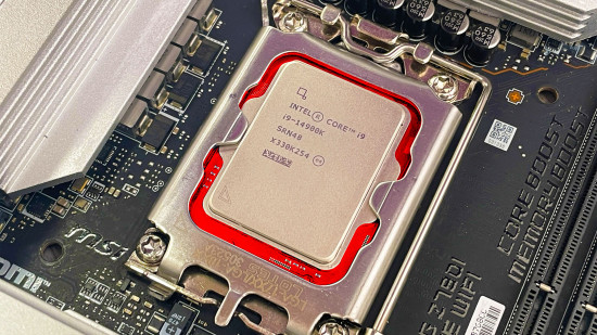 Intel Core i9 14900K CPU in motherboard glowing red