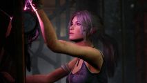Lara Croft works on a generator in the Dead by Daylight Tomb Raider chapter.