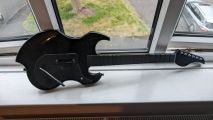PDP Riffmaster Guitar controller review image showing the guitar on the window sill.