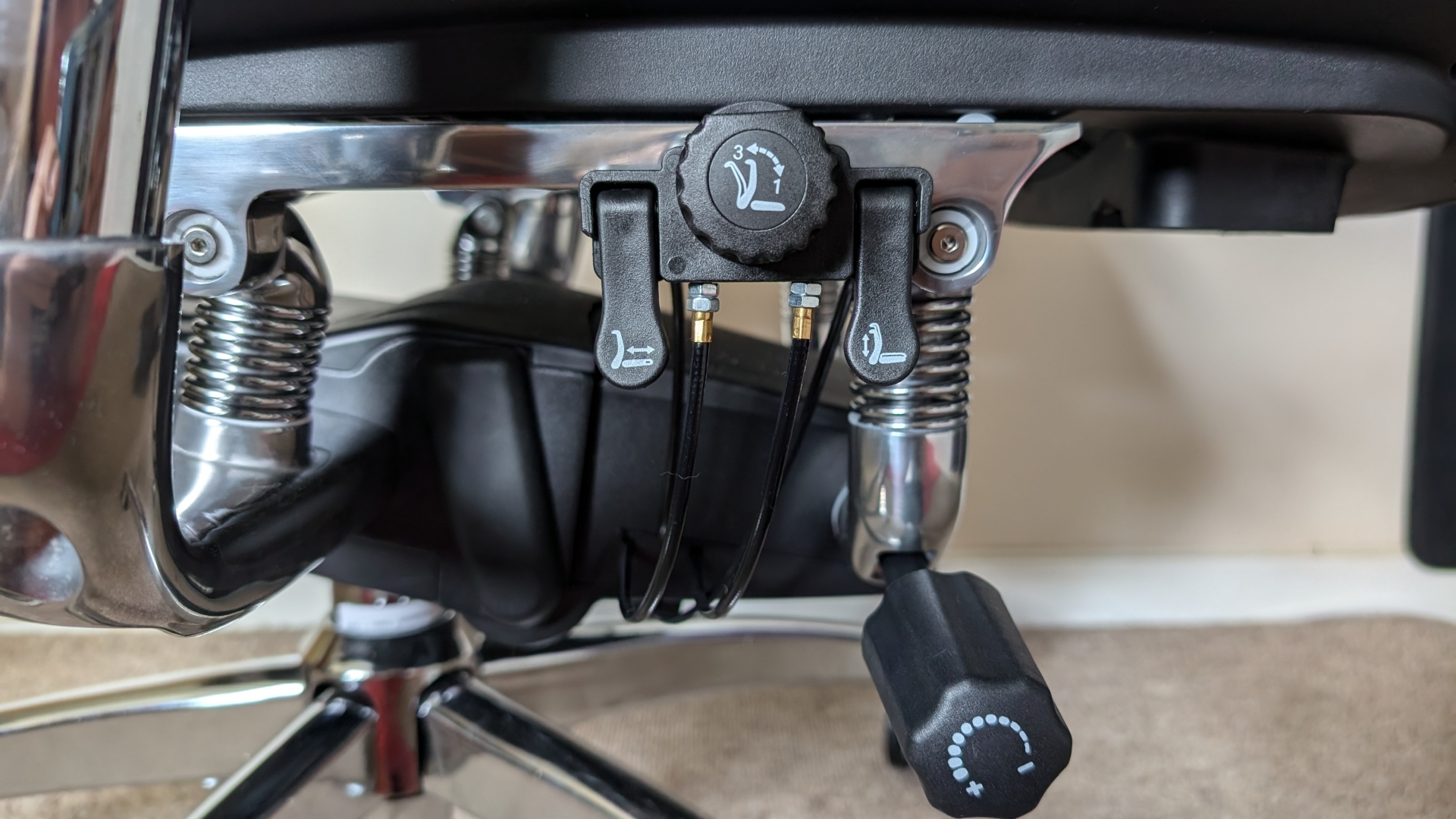 Sihoo S300 ergonomic office chair review image showing all the adjustment knobs on the chair.