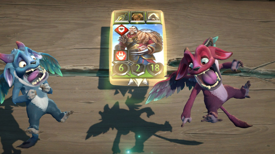 Two cute creatures react comically to a card.