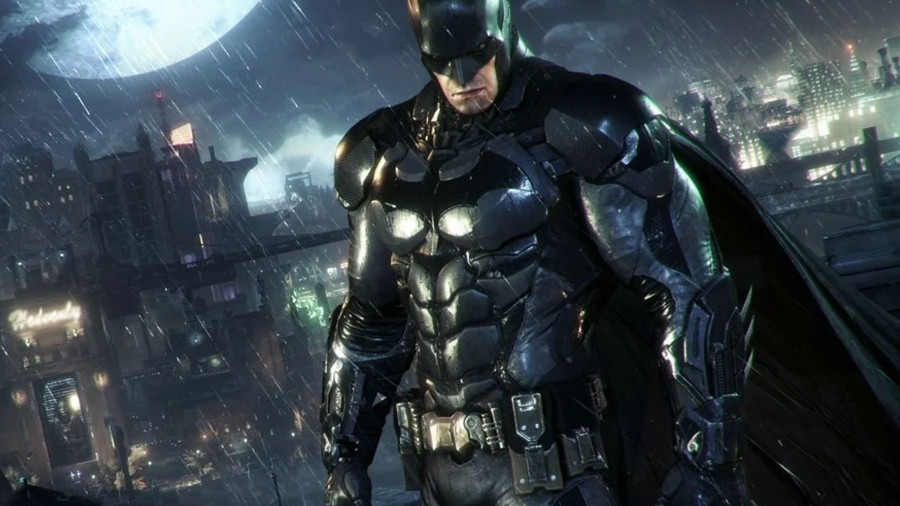 Batman stands in an armored suit in a rainy Gotham.