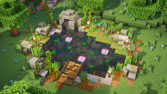 A rustic Minecraft pond with pink flowers and plants growing all around.