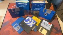 A selection of 3.5-inch PC floppy disks, including games