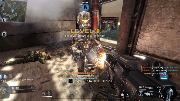 A metal-suited future solider stands still as an SMG fires directly into her chest at point-blank range in Titanfall. Several unlocks and bonuses appear on the screen.